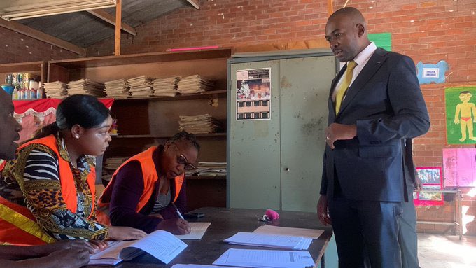 Opposition CCC leader Nelson Chamisa inspecting the voter’s roll at Kuwadzana 2 primary school in Harare on Tuesday 30 May 2023