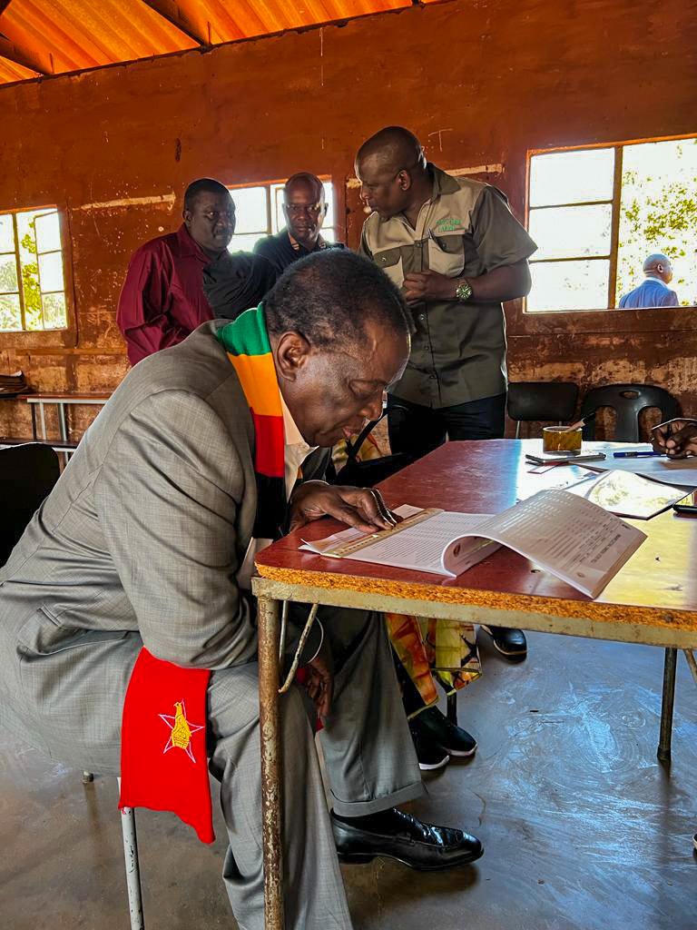 President Mnangagwa checking his name in the voters’ roll