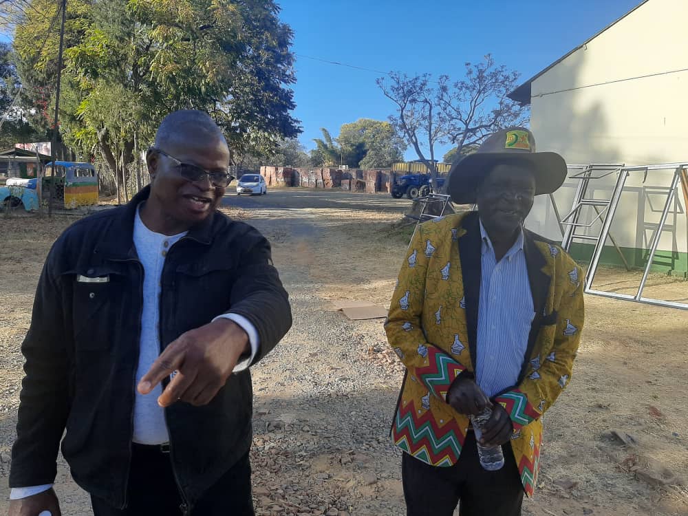 Nehanda July 31 – Mashonaland Central Show Society chairperson Christopher Chingwaru in national dress jacket and his deputy Mr. Gutura