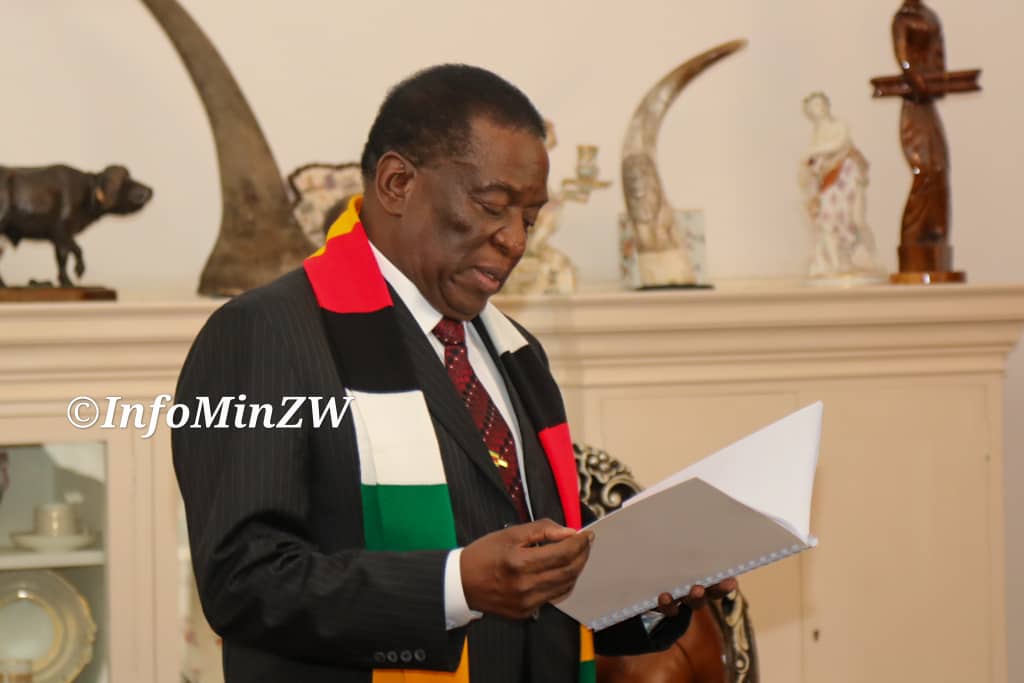 President Mnangagwa going through the land commission report