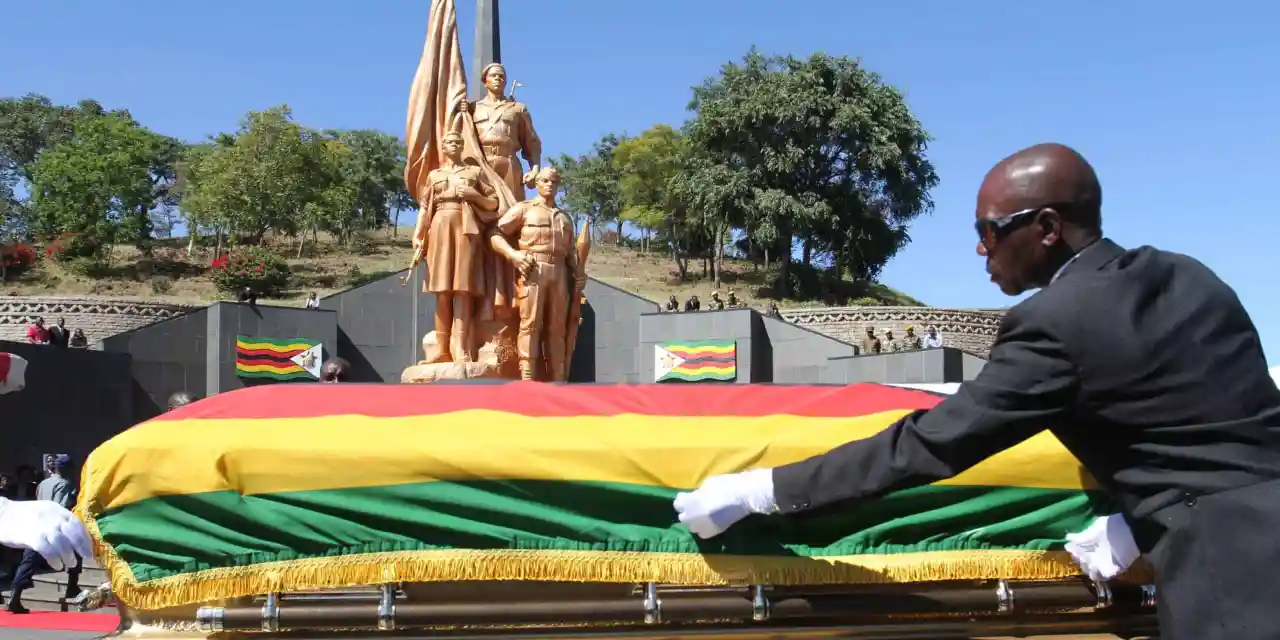 Two national heroes laid to rest in double burial