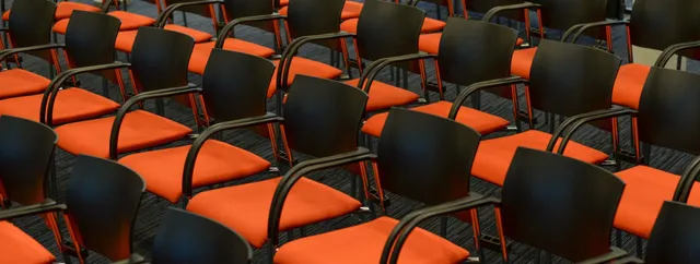 seats-orange-congress-empty-722708-1ed89642-640w